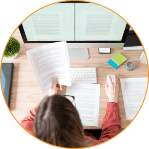 Professional translator reviewing source and target text during a translation quality check